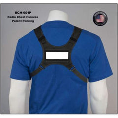 Black radio chest harness on a blue shirt with 'RCH-601P' and 'Patent Pending' text featuring TVP-601 temporary velcro tape.