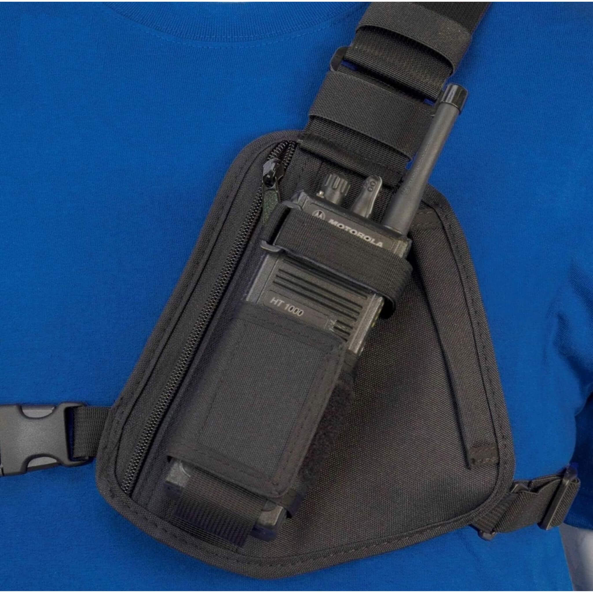 Black shoulder bag RCH-101B Holsterguy radio chest harness with Motorola radio on a blue background