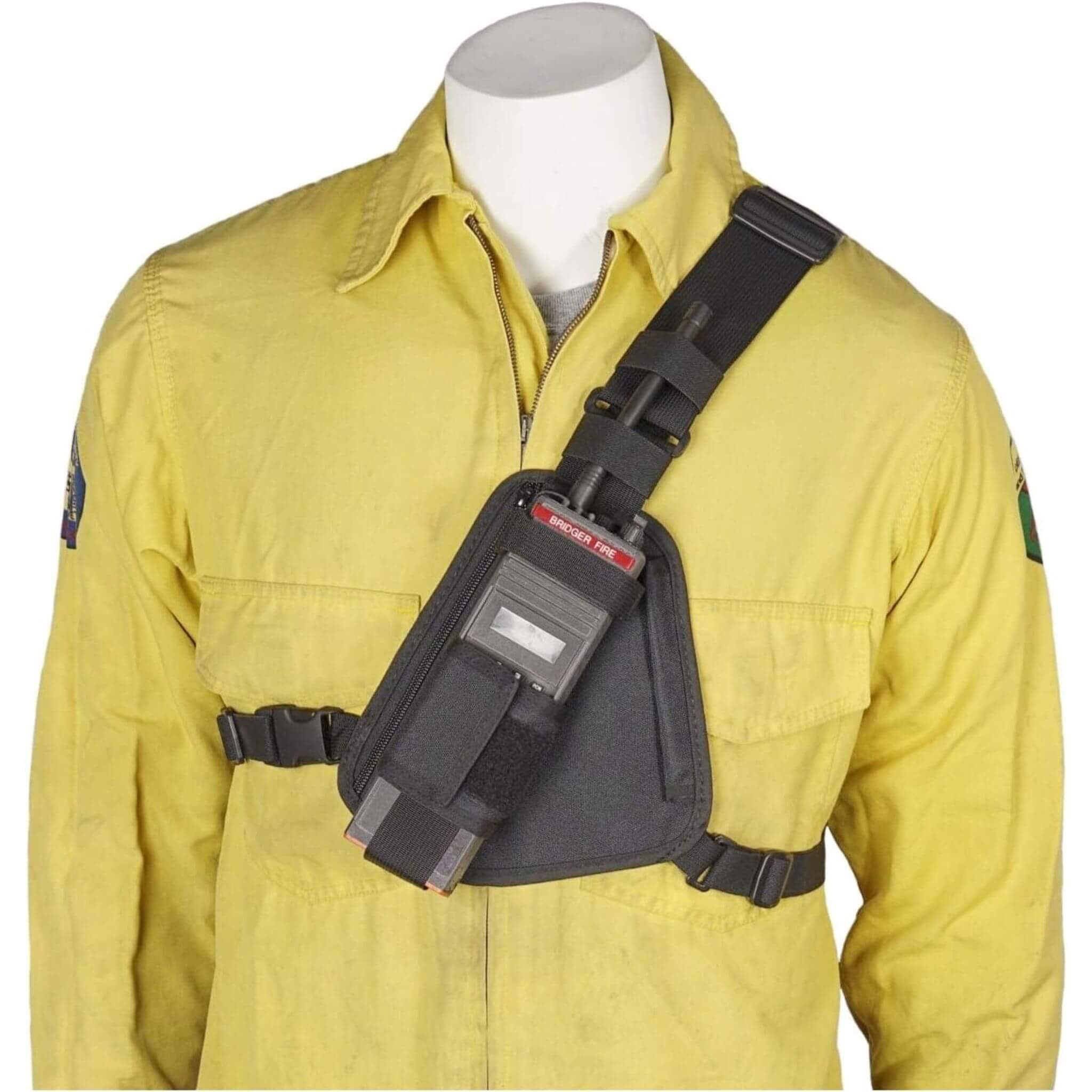 Yellow jacket with a black shoulder bag RCH-101B Holsterguy radio chest harness on a mannequin against a white background
