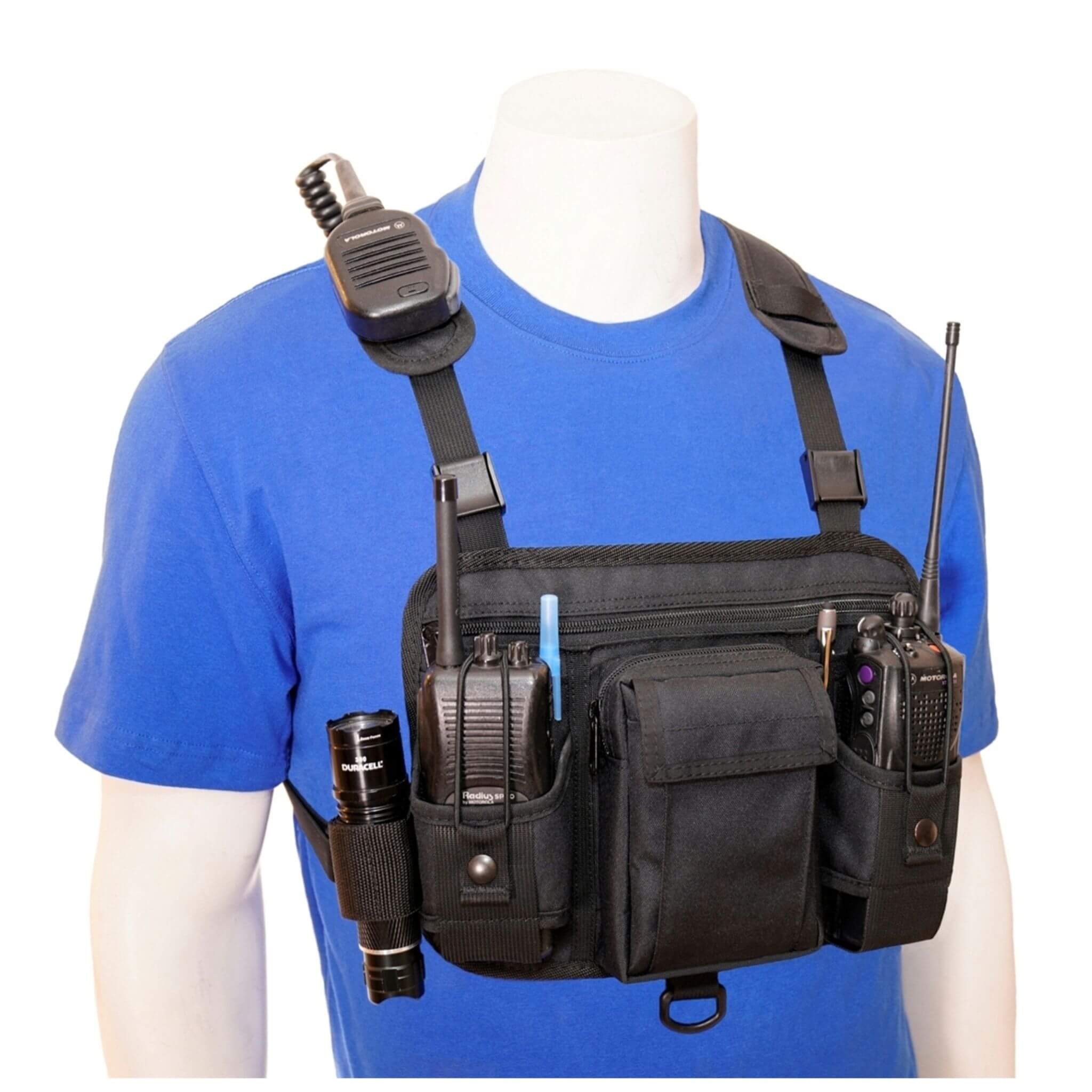 Black tactical vest double radio chest harness 601D with radio and pouches on a mannequin wearing a blue shirt.